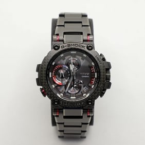 Casio G-Shock MTG-B1000XBD-1AJF Black Dial with Red Resin, Metal, and Carbon Fiber Solar Watch for