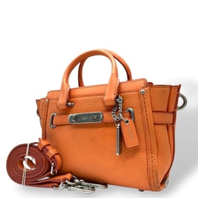 Coach Orange Swagger Handbag, 2-Way Leather Shoulder Bag/Tote Bag with Silver Hardware and Logo Tag,
