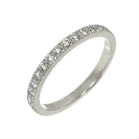 Tiffany & Co. Novo size 9 ring with half diamonds in platinum.