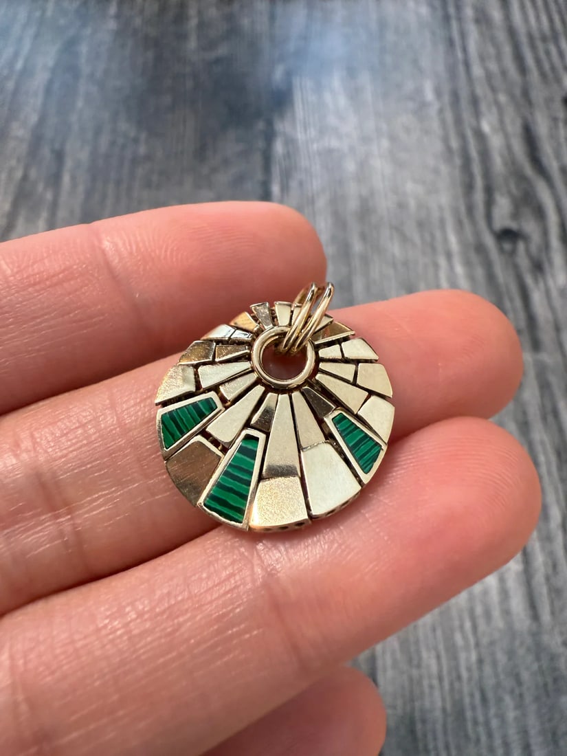 Articulated Malachite and 14K Gold Abstract Spider Web Charm: Metal: 14K Yellow Gold Weight: 3.2 gramsMeasurements: 0.75 inches diameterMarkings: "14Kt ITALY"