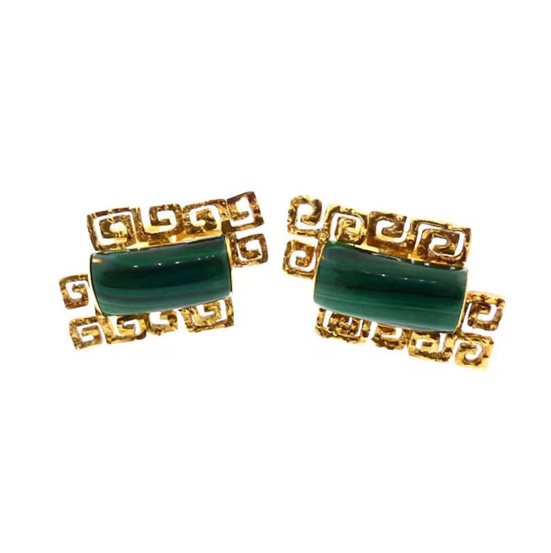Mid-Century Modern 14K Gold & Malachite Cufflinks: A handsome pair of mid-century modern 14K gold and malachite cufflinks reminiscent of an Aztec design. The arch cabochons of malachite have very nice color n markings. The gold surfaces are stippled f