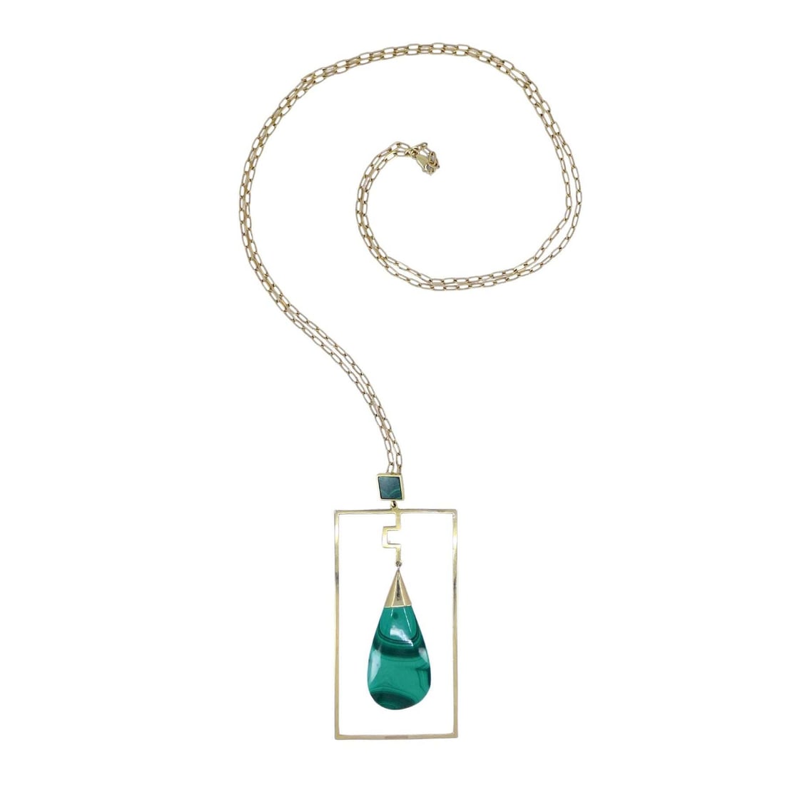 Modernist 10k Gold Malachite Pendant 14k Chain Necklace: Circa: 1970sMaterials: 10k Gold, 14k GoldGemstone: MalachiteWeight: 34.5 GramsMeasurements: 39 3/4" x 4" x 1 3/4"Hallmarks: 14kThis vintage necklace features a bold modernist design with a geometric m