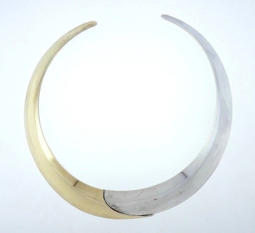 14k Yellow Gold Silver Ed Levin Choker: Vintage choker necklace by Ed Levin made of 14k yellow gold and sterling silver with polished finish? Stamped with a maker's mark and hallmarks for 14k gold and sterling silverMeasurements: A thinner