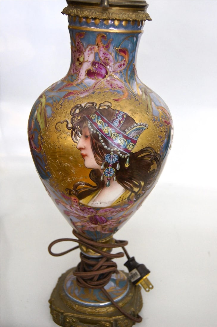 ART NOUVEAU HAND PAINTED SEVRES VASE LAMP PAINTING BRONZE ORMOLU SIGNED ART: ART NOUVEAUHAND PAINTEDSEVRES VASE/LAMPSIGNED BY LBERIBRONZE ORMOLU It is a truly unique & amazing vase that was converted to a lamp.Lamp measures: 21 3/4'' x 6 1/2''HAND PAINTEDSIGNED The hand painte