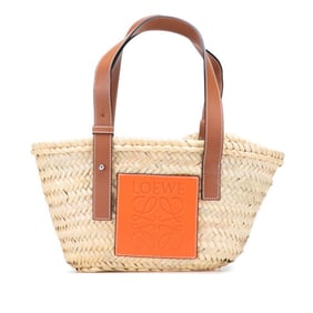 Loewe Anagram Basket Bag Handbag in Beige, Orange, Raffia and Leather for Women