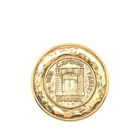 CHANEL 31 RUE CAMBON PARIS medal motif brooch, gold plated, women's