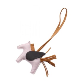 Hermes Hermès Rodeo Pegasus PM bag in mauve pale sesame and Ebene charms. Available pink brown.