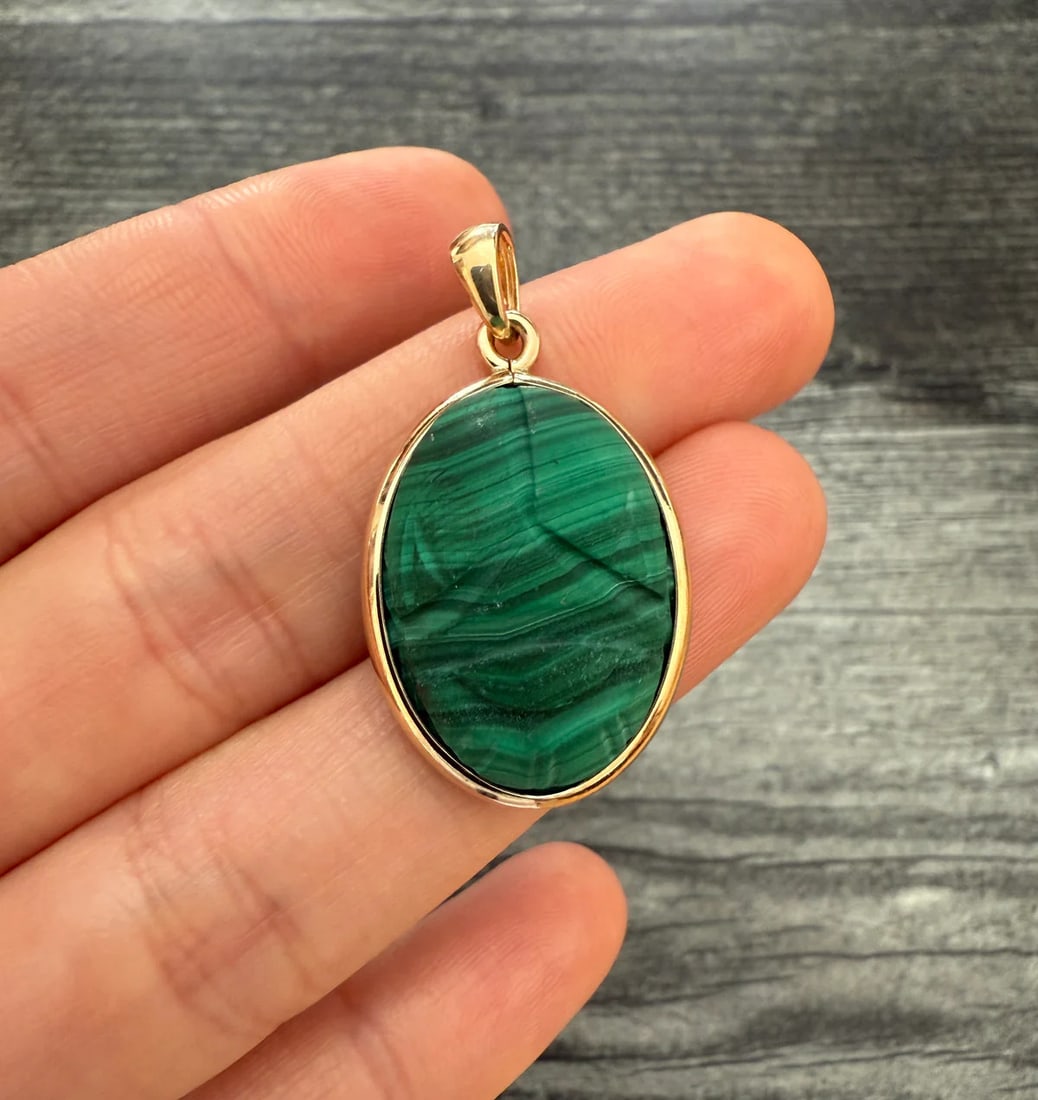 Vintage Malachite and 14K Gold Scarab Pendant: Metal: 14K Yellow Gold Weight: 9.1 gramsMeasurements: 1 inches long by 0.75 inches wide Markings: "14K"