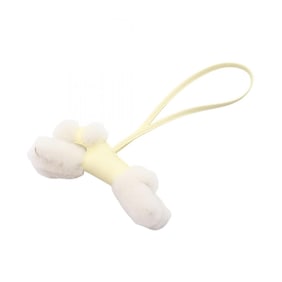 Hermes Hermès Anjou Milo Buddy Charm, a charm accessory in mouton, available yellow and ivory.