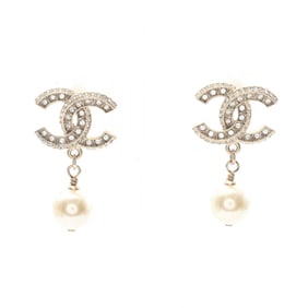 CHANEL Coco Mark earrings with gold-plated rhinestones and faux pearls. Available in gold, clear,