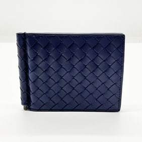 Bottega Veneta navy bifold money clip in leather intrecciato.