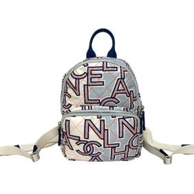 CHANEL Coco Mark Logo Neon Quilted Cotton and Leather Mini Backpack, Blue, 42549