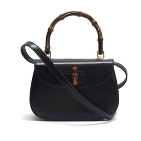 Gucci bamboo handle handbag turn lock black
