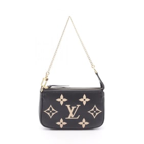 Louis Vuitton Mini Pochette Accessoires Two-Tone Handbag in Monogram Empreinte Leather, Black,
