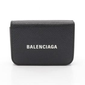 Balenciaga Cash Mini Wallet, a tri-fold leather wallet for women in black (593813).