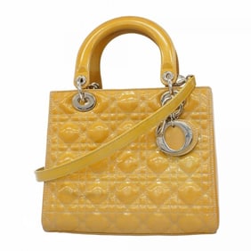 Christian Dior Cannage Lady handbag in beige enamel, a 2-way bag for women.