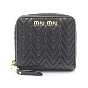 Miu Miu Miu Matelasse round wallet in leather, black for women.