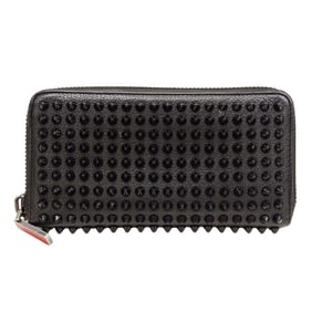 Christian Louboutin wallets for men and women, black leather long wallet with round zipper studs.
