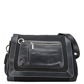 Versace shoulder bag in black leather and polyester for women.