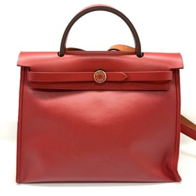 Hermes Hermès Airbag Zip PM 2-way bag, coated canvas and leather, Rouge Piment D stamped.