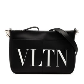 Valentino VLTN logo shoulder bag in black and white leather for women.