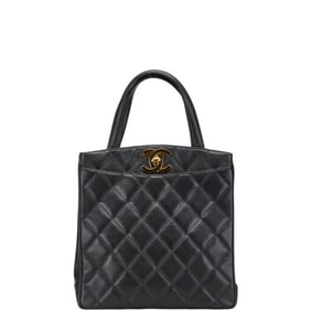 CHANEL Matelasse Coco Mark Handbag in Black Caviar Skin for Women