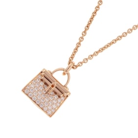 Hermes Hermès Amulette Kelly necklace pendant with 38 diamonds totaling 0.39ct in 18K pink gold.