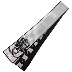 Like new Chanel scarf/shawl with dotted chain and lion motifs in black silk. 1567 CHANEL