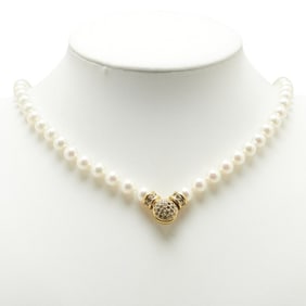 Christian Dior Dior pearl and rhinestone necklace, gold plated, for women.