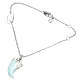 Christian Dior Dior logo fang motif bracelet in silver and turquoise blue metal for women.