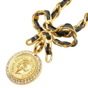 Vintage Chanel coin ribbon rhinestone choker necklace, gold plated, for women.