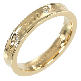 Tiffany & Co. 1837 ring, size 15, 18K Yellow Gold with two diamonds, approximately 6.1g.