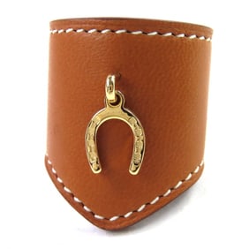 HERMES Porte Bonheur scarf ring in leather, silk, and maroon arzan with gold hardware. Made France