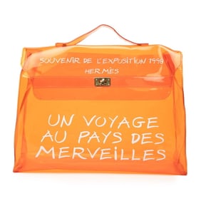 Hermès Vinyl Kelly "Journey to Wonderland" Exhibition Handbag, Orange, Gold Hardware, Vinyl,