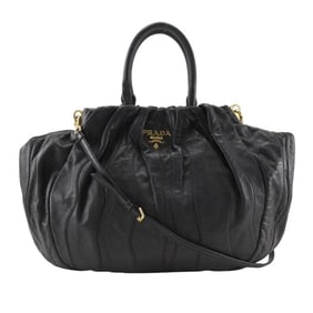 Prada logo handbag, 2-way shoulder bag in pumpkin and black lambskin, A5 size, magnetic closure,