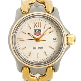 TAG HEUER Celdate Women's Watch S05.008M, Stainless Steel with Gold-Plated Quartz Movement, Analog