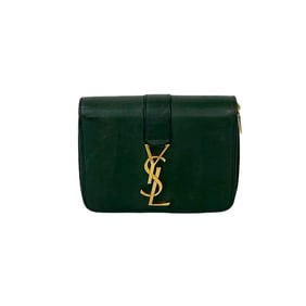 Yves Saint Laurent SAINT LAURENT PARIS Cassandra YSL logo hardware leather round zip bifold wallet