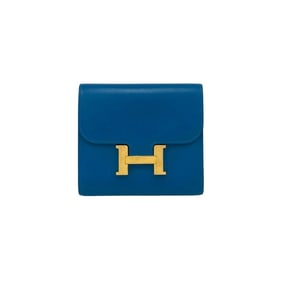 A stamped HERMES Constance Compact Calf Leather Bi-fold Wallet Blue 28793
