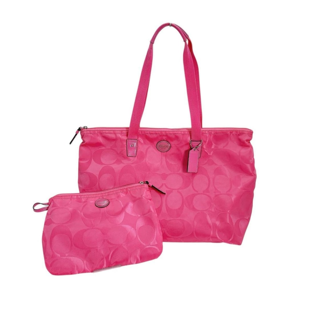 Coach Signature Nylon Tote Bag in Pink: --- Catalog ---Category: SizeSize (HxWxD): 33cm x 47cm x 19cm / 12.99'' x 18.5'' x 7.48''Category: DesignType: Pouch, Tote bagColor: PinkGender: WomenMaterial: Signature line Category: GeneralBrand: C