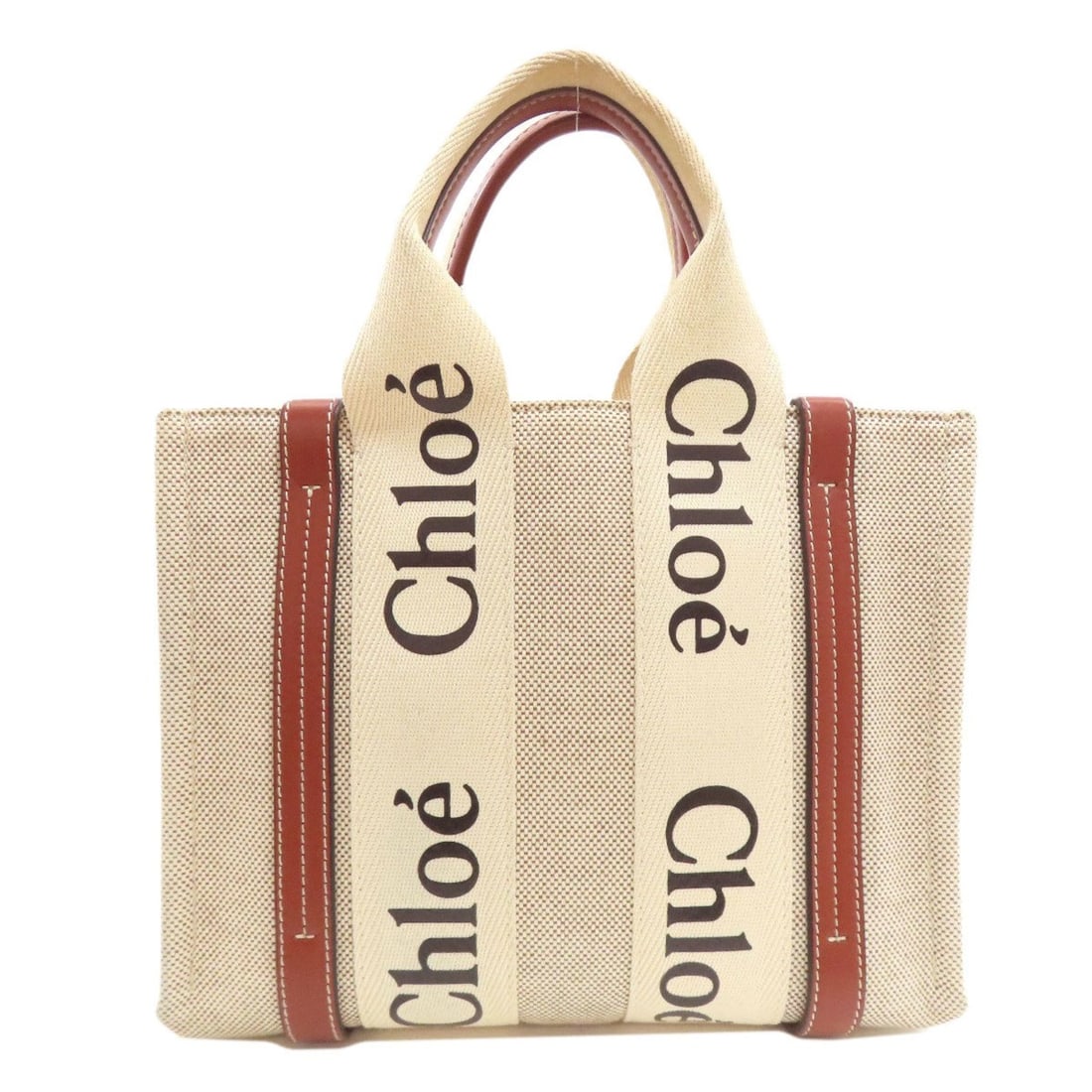 Chloé Chloe Woody Small Canvas Handbag for Women: --- Catalog ---Category: SizeSize (HxWxD): 20cm x 26.5cm x 8cm / 7.87'' x 10.43'' x 3.14''Category: DesignType: HandbagColor: Beige, BrownGender: WomenMaterial: Canvas Category: GeneralBrand: Chloé--