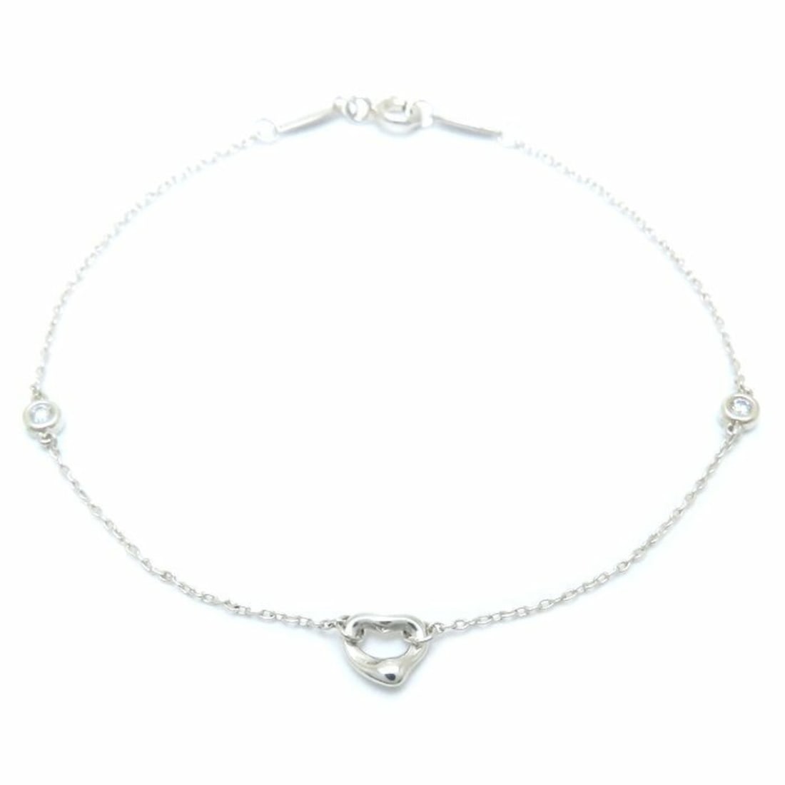 TIFFANY & Co. Tiffany By the Yard Heart Bracelet with 2 Diamonds and Elsa Peretti Sterling Silver,: --- Catalog ---Category: SizeWeight: 1.4g / 0.04oz.Total Length: 21cm / 8.26''Category: DesignType: Charm braceletMetal: SilverStone: DiamondGender: WomenMetal Purity: Silver925Category: GeneralBrand: