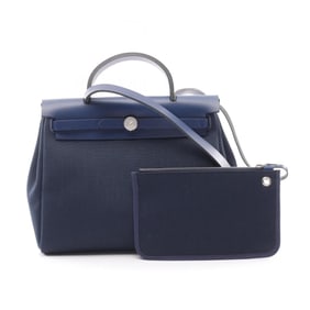 Hermes Hermès Airbag Zip PM Le Tourne in Blue Indigo and Sapphire. Also available: a Toile
