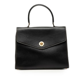 Celine logo handbag in black leather for women.