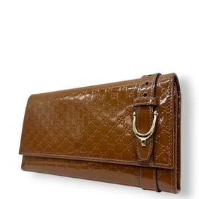 Gucci Micro Guccissima Abbey D-ring double-hook long wallet in patent leather with GG embossing,