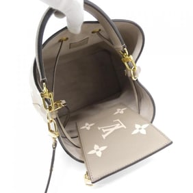 Louis Vuitton Two-Tone Monogram Empreinte Neo Noe MM Shoulder Bag M45555