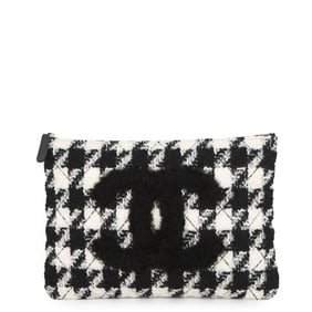 Chanel clutch bag with Coco mark, tweed, and houndstooth pattern. Also available: a second in black