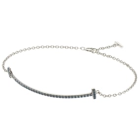 Tiffany & Co. T Smile Blue Topaz Bracelet in 18K White Gold for Women.