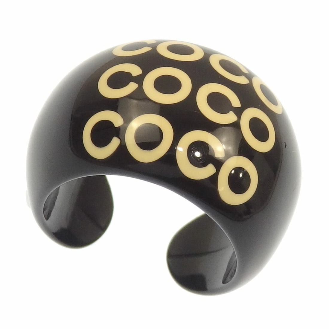 Chanel COCO Ring, Women's, Plastic, Size 12, Black, 01P: --- Catalog ---Category: SizeJP Size: 12US Size: 6.5Category: DesignType: Band ringColor: BlackGender: WomenMaterial: PlasticCategory: GeneralBrand: Chanel--- Item List ---Section: ConditionRanking: R
