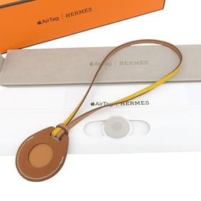Hermes Hermès Air Tag Two-Tone Leather Strap, Brown and Yellow