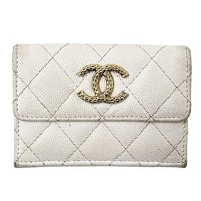 CHANEL Matelasse Women's Tri-fold Wallet in White Caviar with Gold Hardware.
